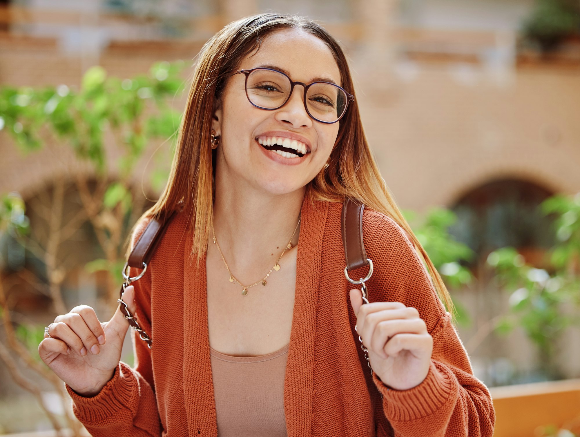 Happy, woman and student with education and portrait university and backpack, scholarship and outdo